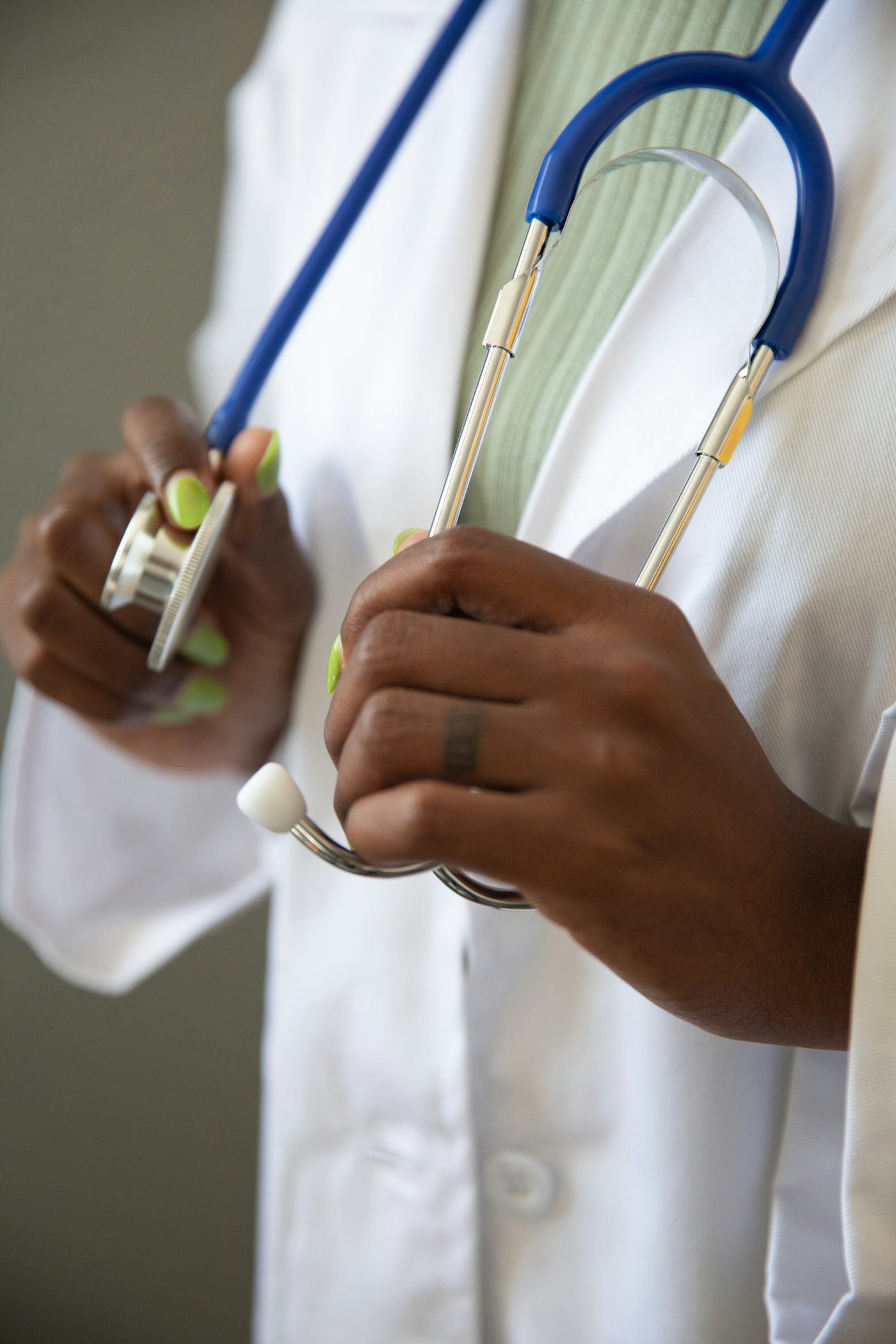 Physician holding a stethoscope